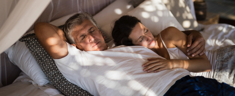 senior-couple-sleeping-on-canopy-bed-2023-11-27-05-15-16-utc-fp